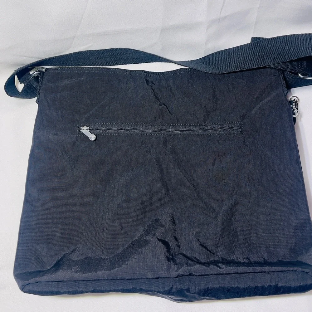 Kipling Black and Tan Messenger Bag with Multiple Compartments